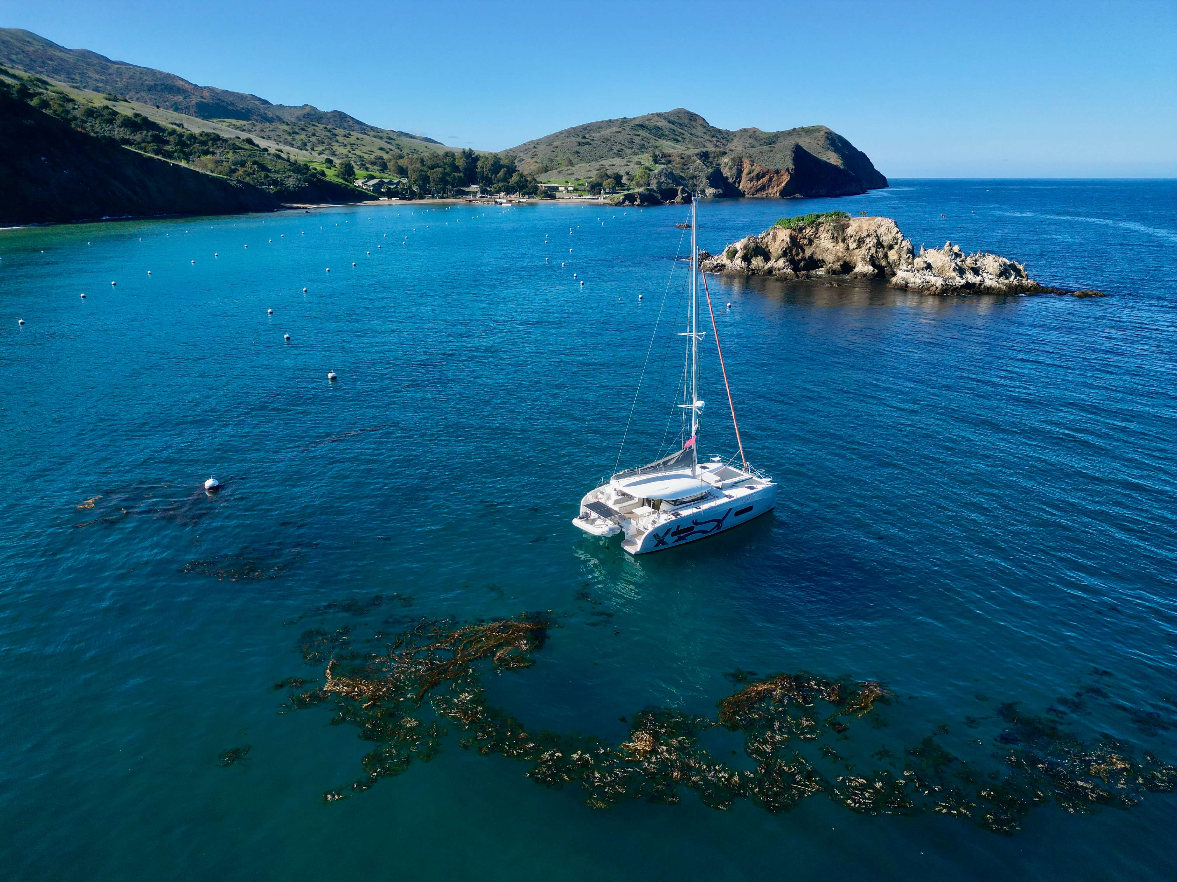 Bright coastal setting for family-focused catamaran cruising